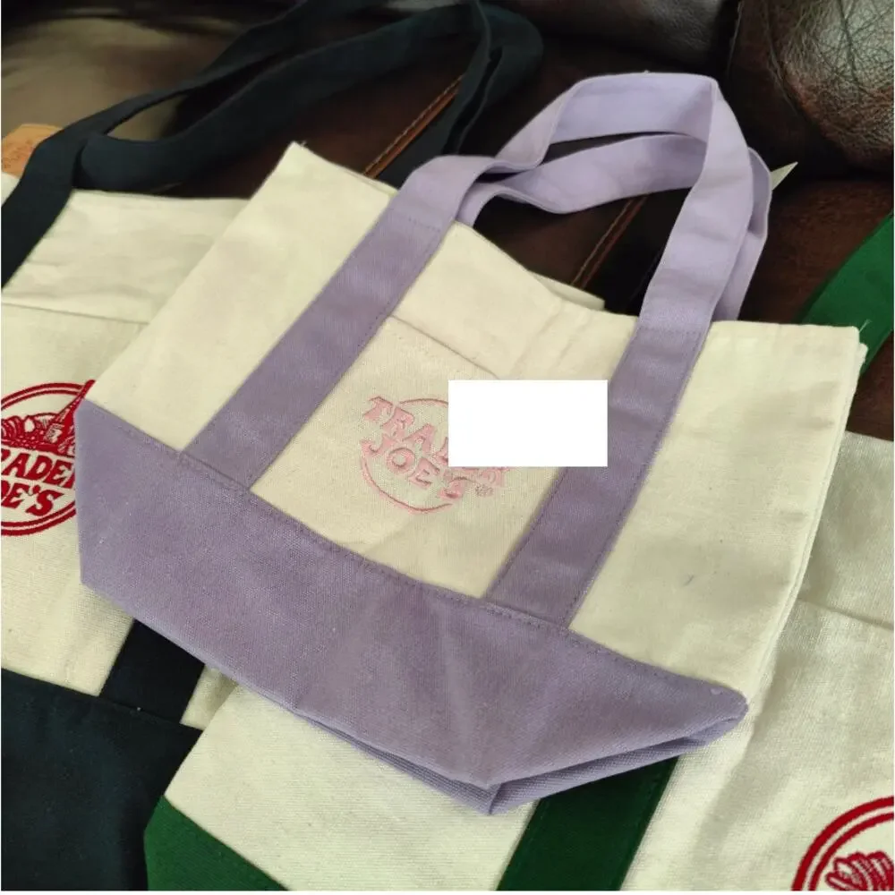 TWO (2) LARGE LAVENDER TRADER JOES TOTE BAGS! BRAND NEW - Picture 2 of 3